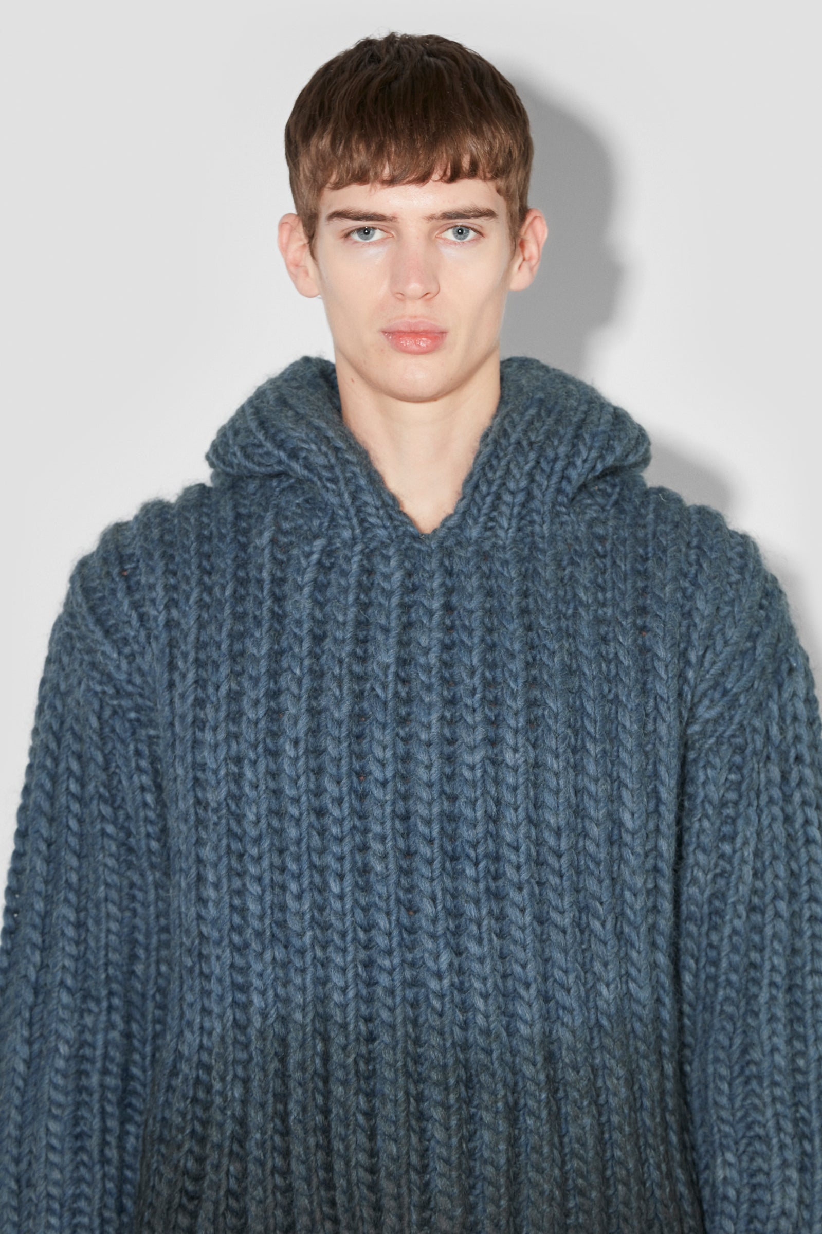 Coated Bulky Knitted Hoodie